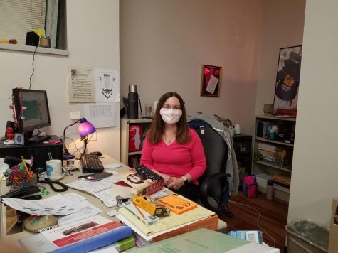 Mrs. Beuning sitting at her desk during class
Photo cred: La Della Gallagher