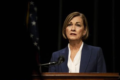 Gov. Kim Reynolds speaks at a press conference 