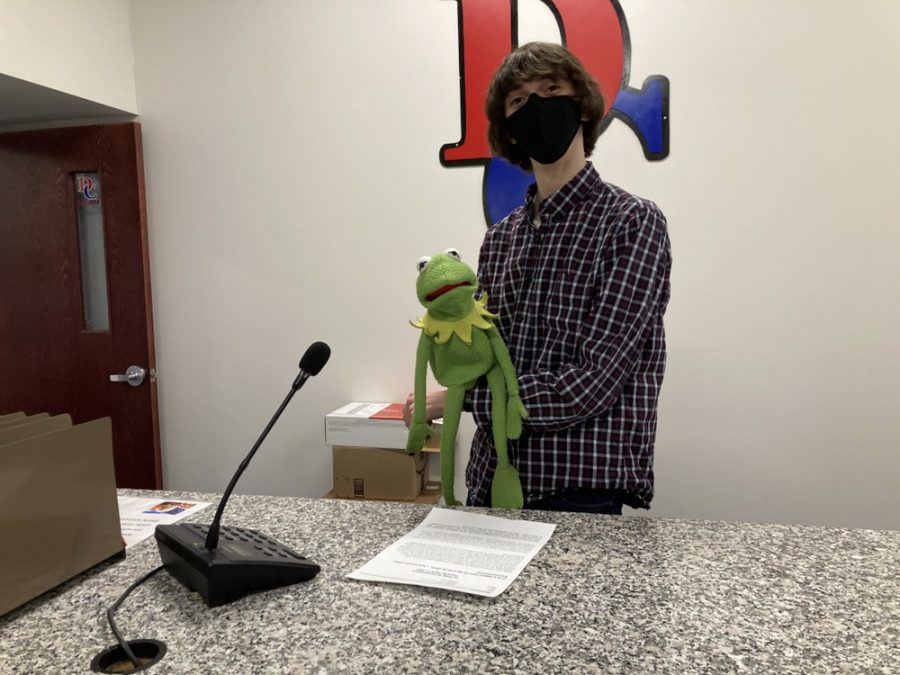 Wyeth Platt and Kermit stand ready to inform the school of the news 