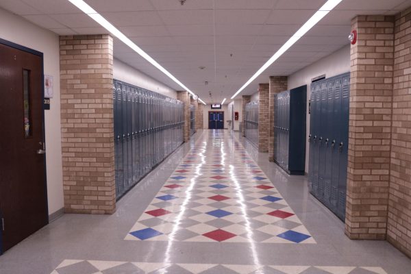 The hallway where the male entered.
